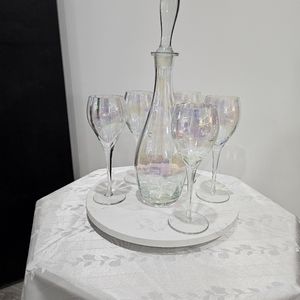 Iridescent Decanter plus 5 wine glasses. Not used. They have been in Moms cabine
